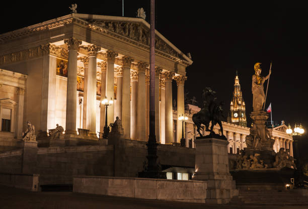 Austrian Parliament at night, it was erected between 1893 and 1902 by Carl Kundmann, Josef Tautenhayn, Hugo Haerdtl