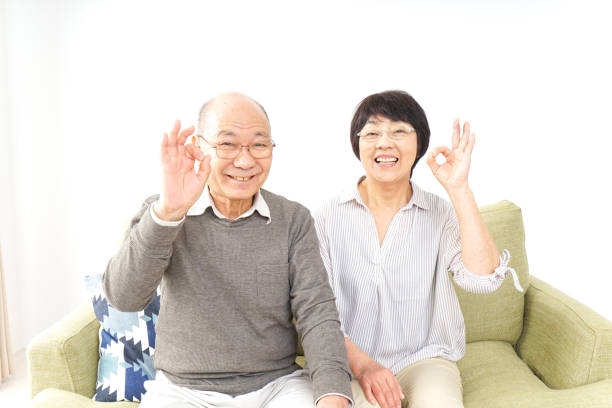istock Senior couple giving ok sign 919731564