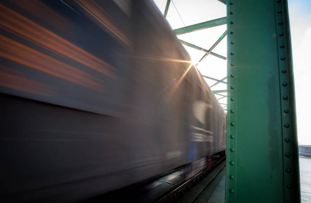 istock Close up picture of freight train in motion on bridge 919755846