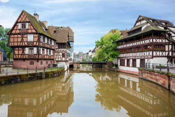 Photo of Quaint timbered houses of Petite France in Strasbourg, France. Franch traditional houses at Strasbourg, France.