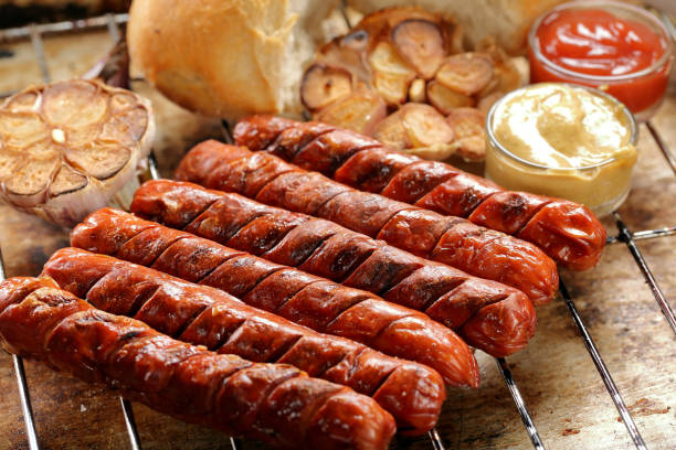 istock Grilled sausages with sauce ketchup and mustard 919768046
