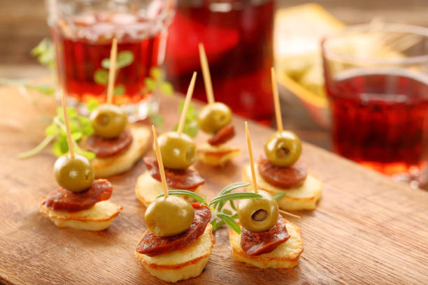 istock Baked potatoes spanish snack with sausage chorizo 919768682
