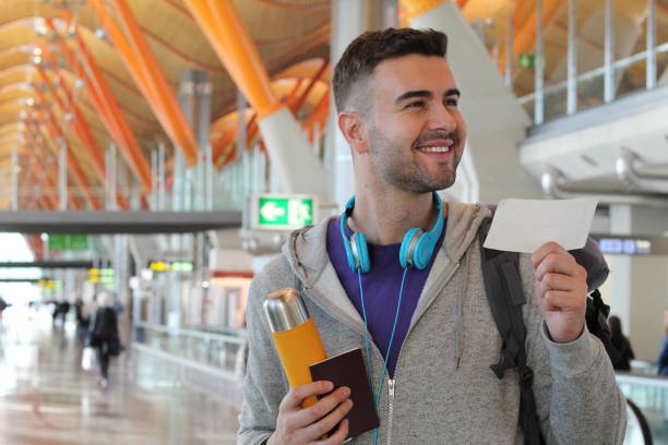 istock Happy traveler about to board 919769136