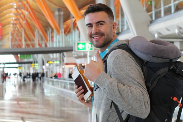 istock Joyful man giving thumbs up during trip 919771842