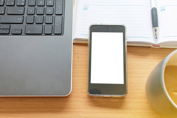 istock Business Working table with the laptop smartphone. 919777936