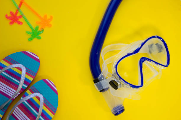 istock Yellow background with diving mask 919807410