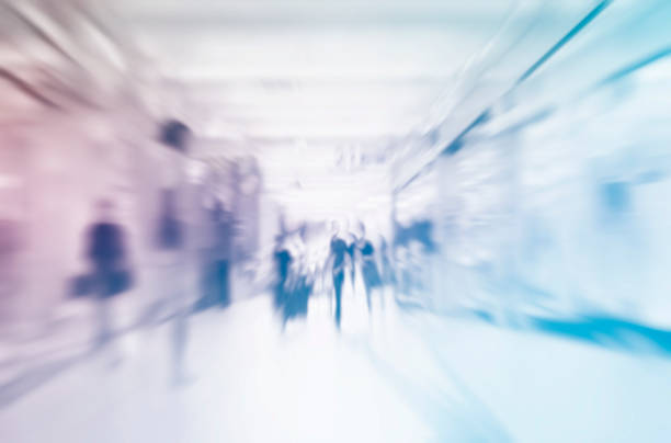 Abstract blur people background Motion Blurred People in the Shopping Mall defocused office business motion stock pictures, royalty-free photos & images