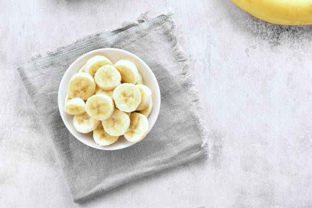istock Banana slices in bowl 919819112