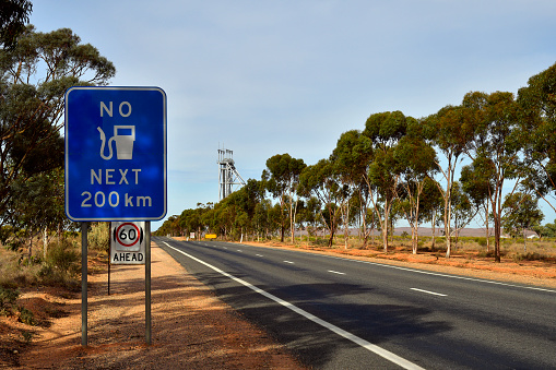 Australia, sign for next petrol station far away from Broken Hill city