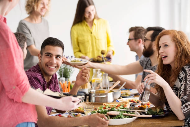 istock Friends eating healthy vegan dinner 919826468