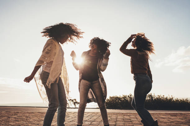 istock Friends dancing and having fun on the road 919845586