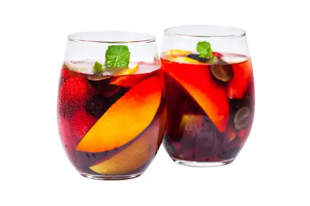 Summer Red Wine Sangria Drink Isolated on White Background. Selective focus.