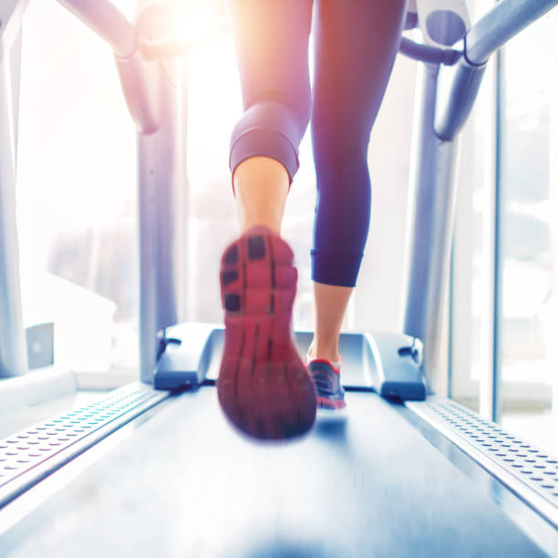 istock Woman running on treadmill 919871690