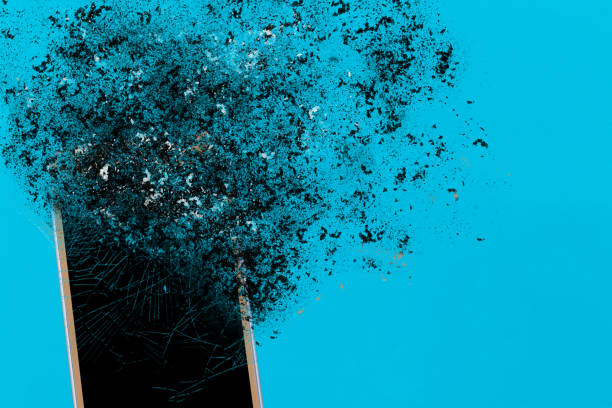 Smartphone explosion on blue background. Edit by using explosion effect stock photo