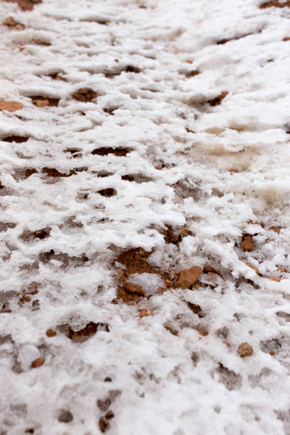 istock snow on red clay in nature 919892072