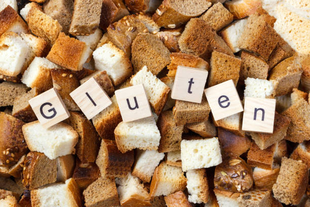 istock Slice of rusk bread with Gluten text concept 919905652
