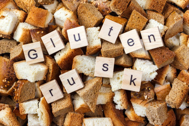 istock Slice of rusk bread with Gluten rusktext concept 919905674