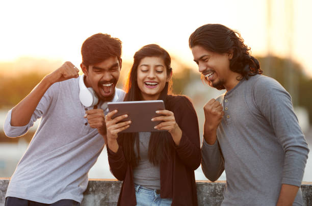 istock Excited of friends watching tv from tablet 919910932