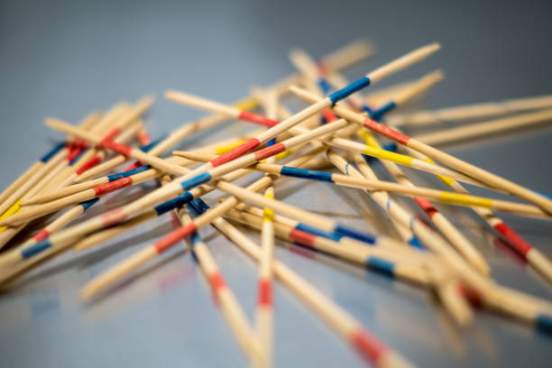 istock Close-Up Of Multi Colored Wooden Sticks On Table 919919514