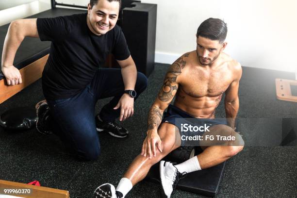 Athlete Getting Physical Therapy Stock Photo - Download Image Now - Activity, Adult, Adults Only