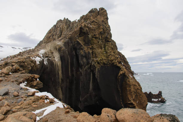 istock Rock in Antarctic sea near Deception island 919960686