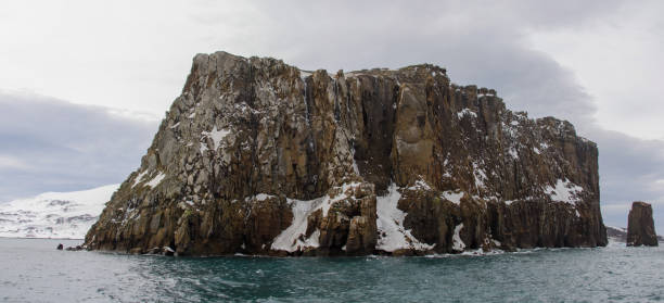 istock Rock in Antarctic sea near Deception island 919960818