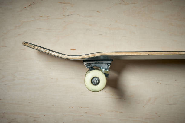 istock side view of skateboard on a wooden background 919963650
