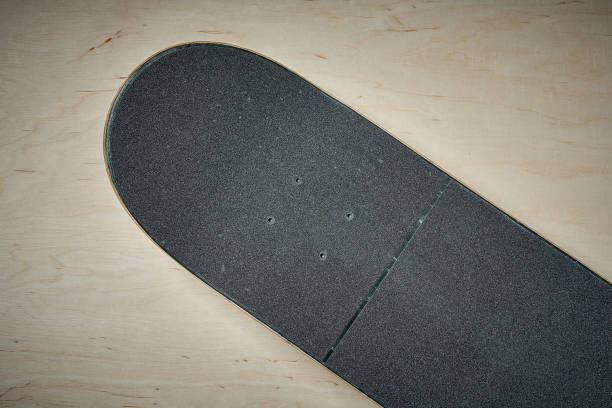 istock top view of skateboard on wooden background 919963688
