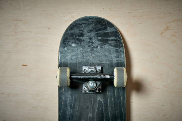 istock top view of skateboard on wooden background 919963834