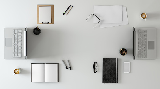 Top knolling view of an office desk. business template. teamwork scene, with laptop, papers, notebook, tablet etc. creative mess designer background. mock up template. render