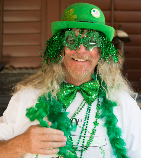 istock Happy Green Party Man 919976786