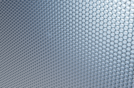 Technological macro background of honeycombs of hexagons. Abstract background.
