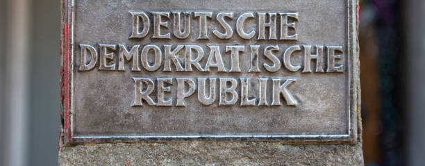 istock historic east germany sign in berlin germany 919983836