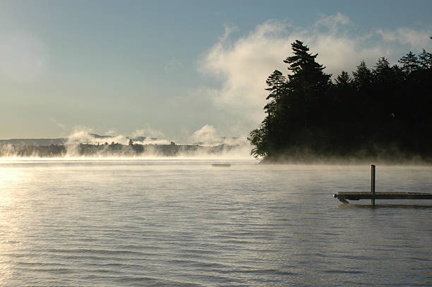 Morning mist on the lake stock photo