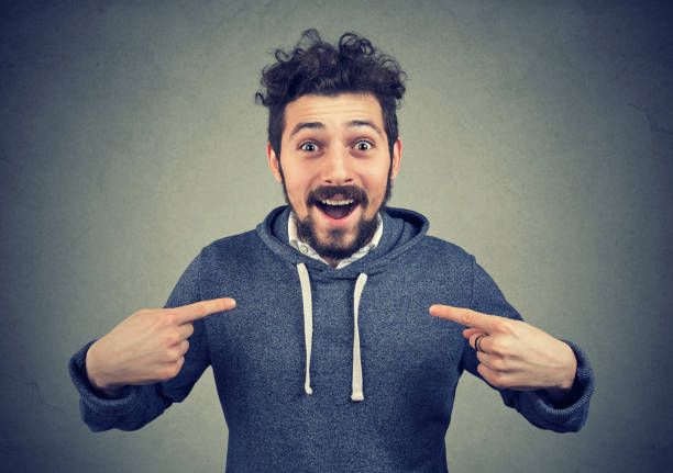 istock Excited hipster pointing at himself in astonishment 920000492
