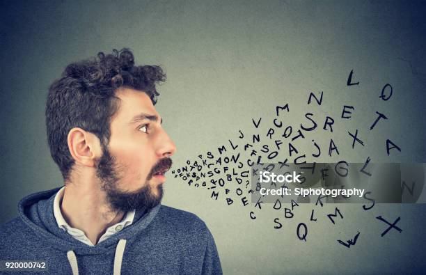 Man Talking With Alphabet Letters Coming Out Of His Mouth Stock Photo - Download Image Now