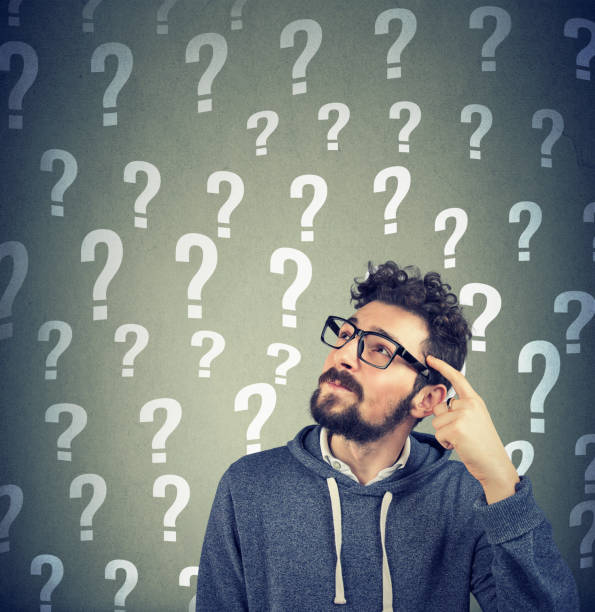 istock Thoughtful confused handsome man has too many questions and no answer 920000902