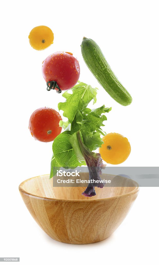 Fresh vegetables falling  Cut Out Stock Photo