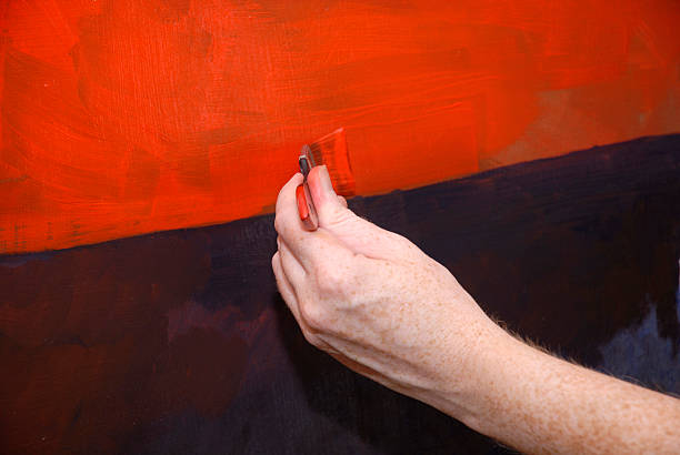 istock Artist´s hand painting 92002416