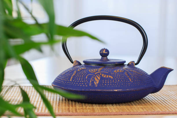 istock Blue Chinese cast iron teapot. Tea drinking. 920030360