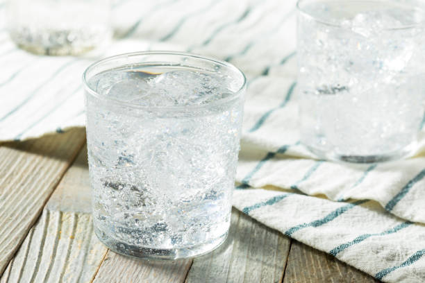 Fresh Spring Sparkling Water Fresh Spring Sparkling Water with Ice in a Glass carbonated stock pictures, royalty-free photos & images