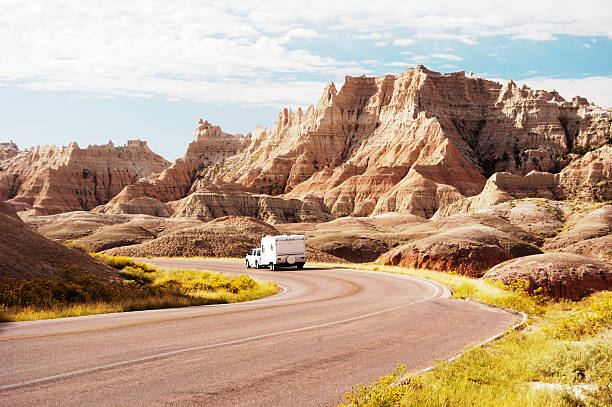 RV in the Badlands  badlands stock pictures, royalty-free photos & images