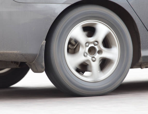 istock car wheel in motion on the road 920038102