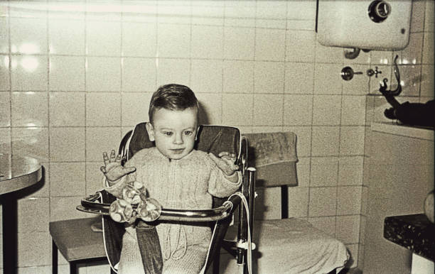istock Vintage baby boy in the kitchen 920038122