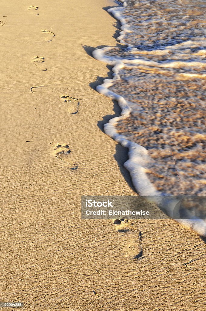 Tropical beach with footprints  Barefoot Stock Photo
