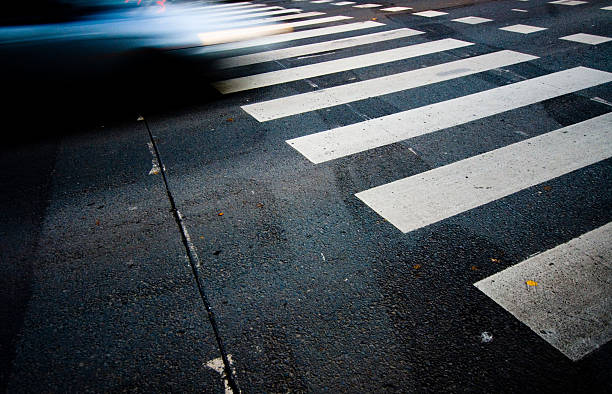 motion blurred car and zeebra stock photo