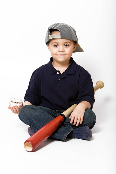 мальчик с бейсбольной битой - back to front стоковые фото и изображения