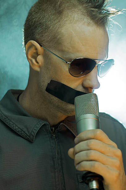 istock Man being censored in concert 92005349