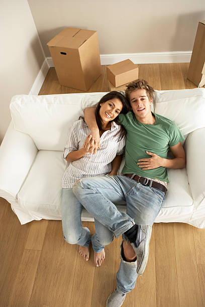 istock Couple Moving Into New Home 92005638