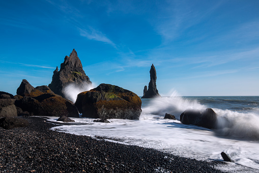 The coast of Reynisdrangar; a famous place in iceland with a black beach.